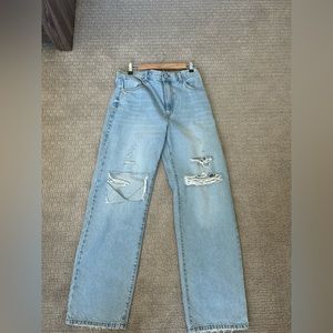 Ripped light wash straight jeans
